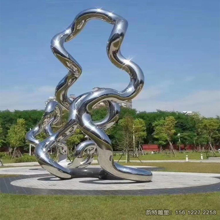 廣場不銹鋼鏡面飄帶雕塑,扭曲飄帶絲帶雕塑造型 廣場不銹鋼鏡面飄帶雕塑,扭曲飄帶絲帶雕塑造型